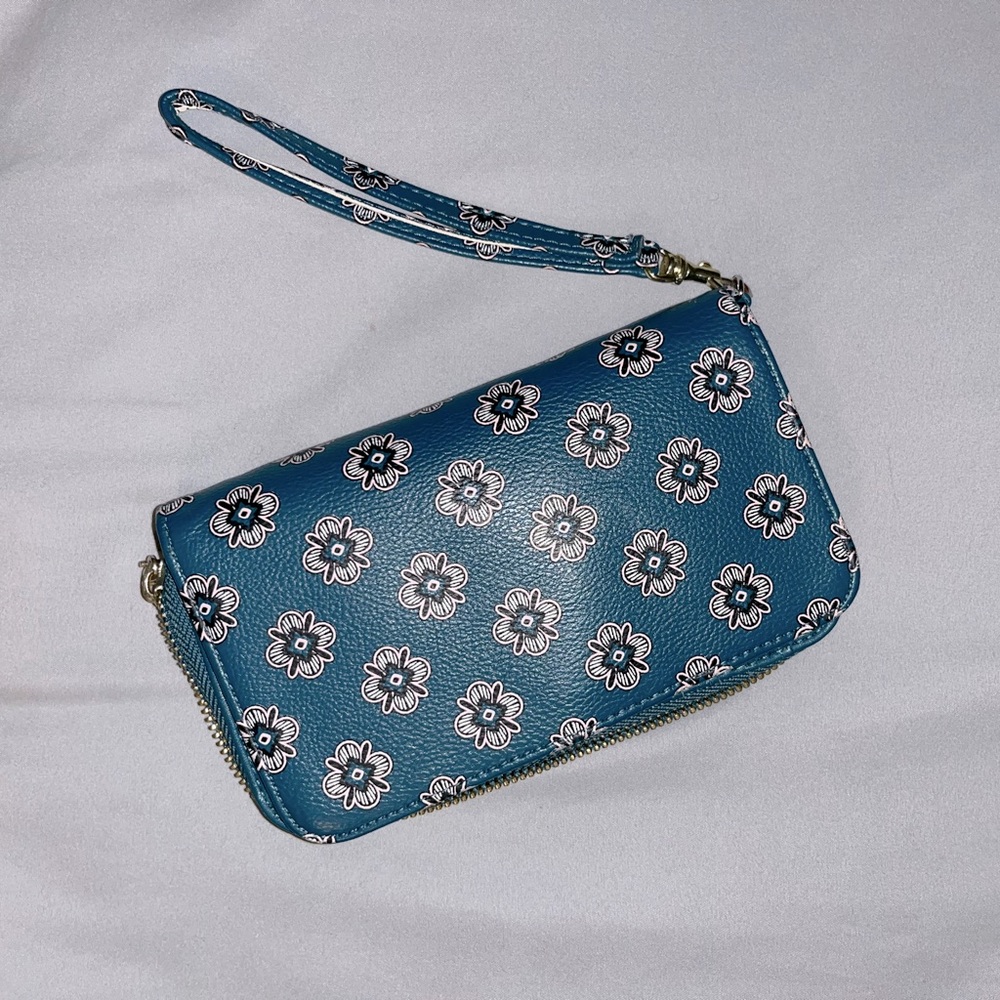 Blue faux leather wallet with wrist strap